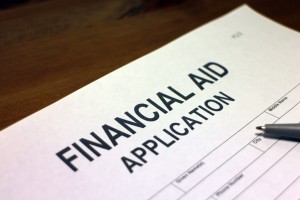 Someone filling out Financial Aid Application form